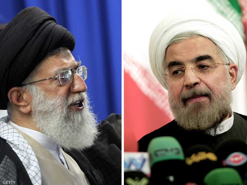 الرئيس الإيراني حسن روحاني (يمين) والمرشد علي خامنئي (يسار)